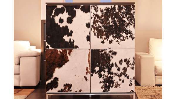 11 Ways To Use Cowhide Rugs In Your Home Decor