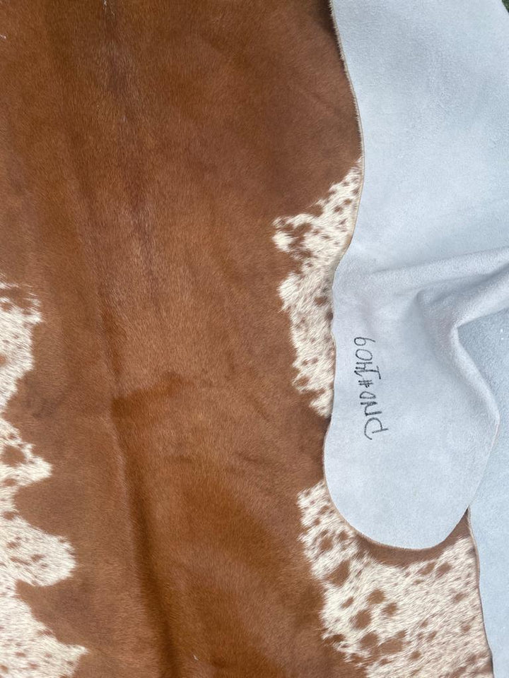 Big brown and white Cow Hide 1409