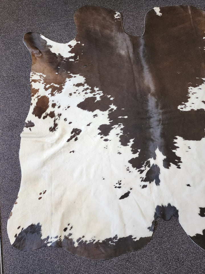 Cowhide rug beautiful tri splashed rug